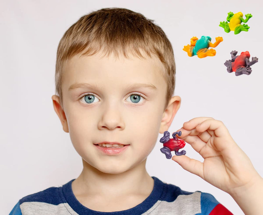 Fruidles Rainforest Gummi Frogs mixed colors on a surface ideal for party treats.