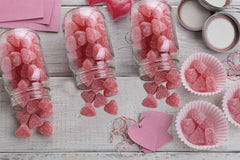Fruidles Valentine's jelly hearts on a festive plate for gifting.