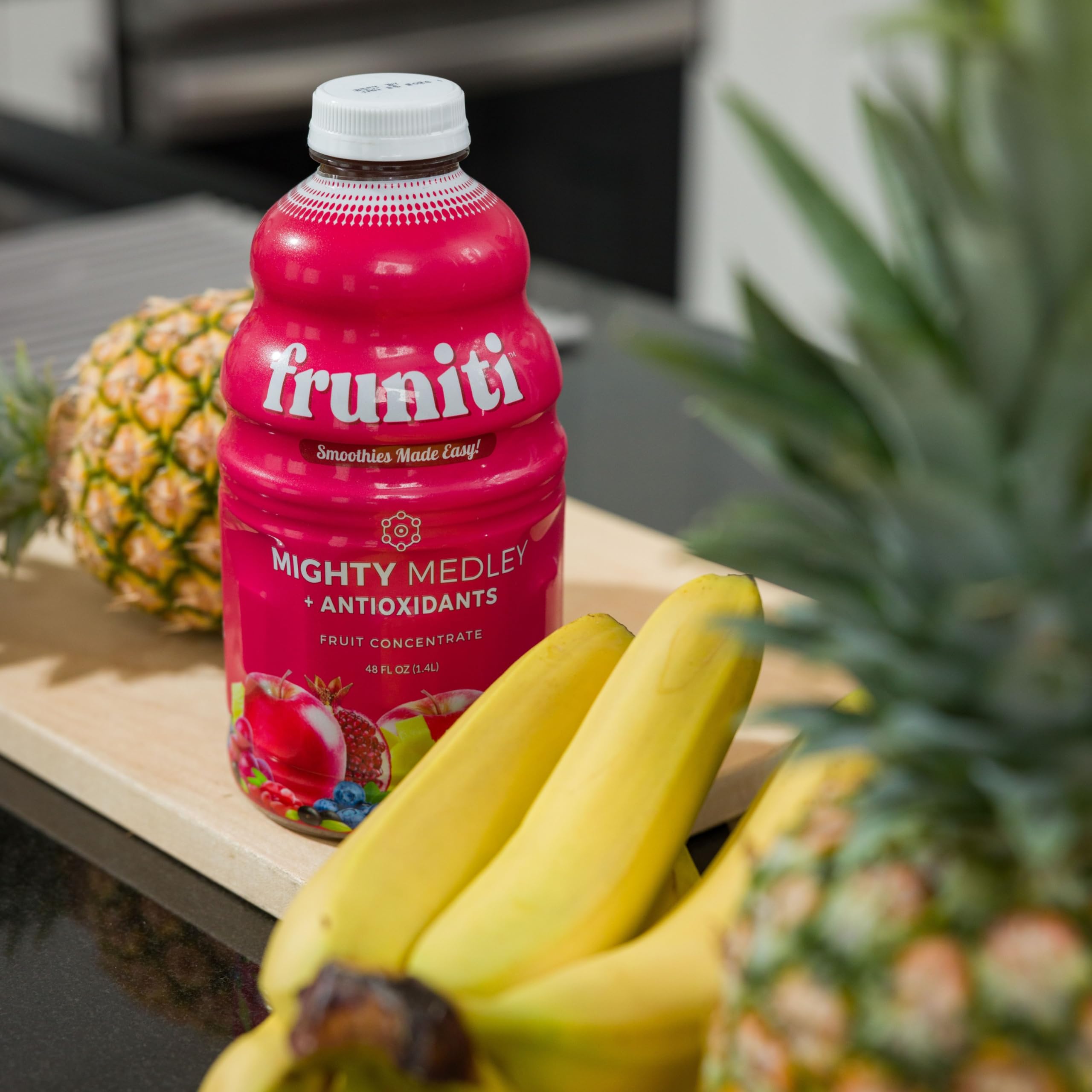 Fruniti Superfruit Medley serving on table suggests versatile, family-friendly smoothies.
