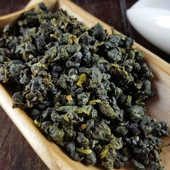FullChea Alishan tea brewing in cup to highlight aroma and smooth finish.