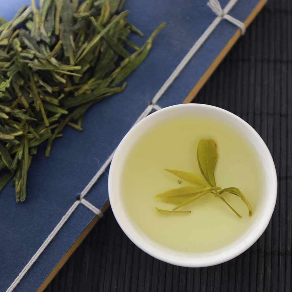 FullChea Longjing cup evokes a mindful moment with a gentle aroma.