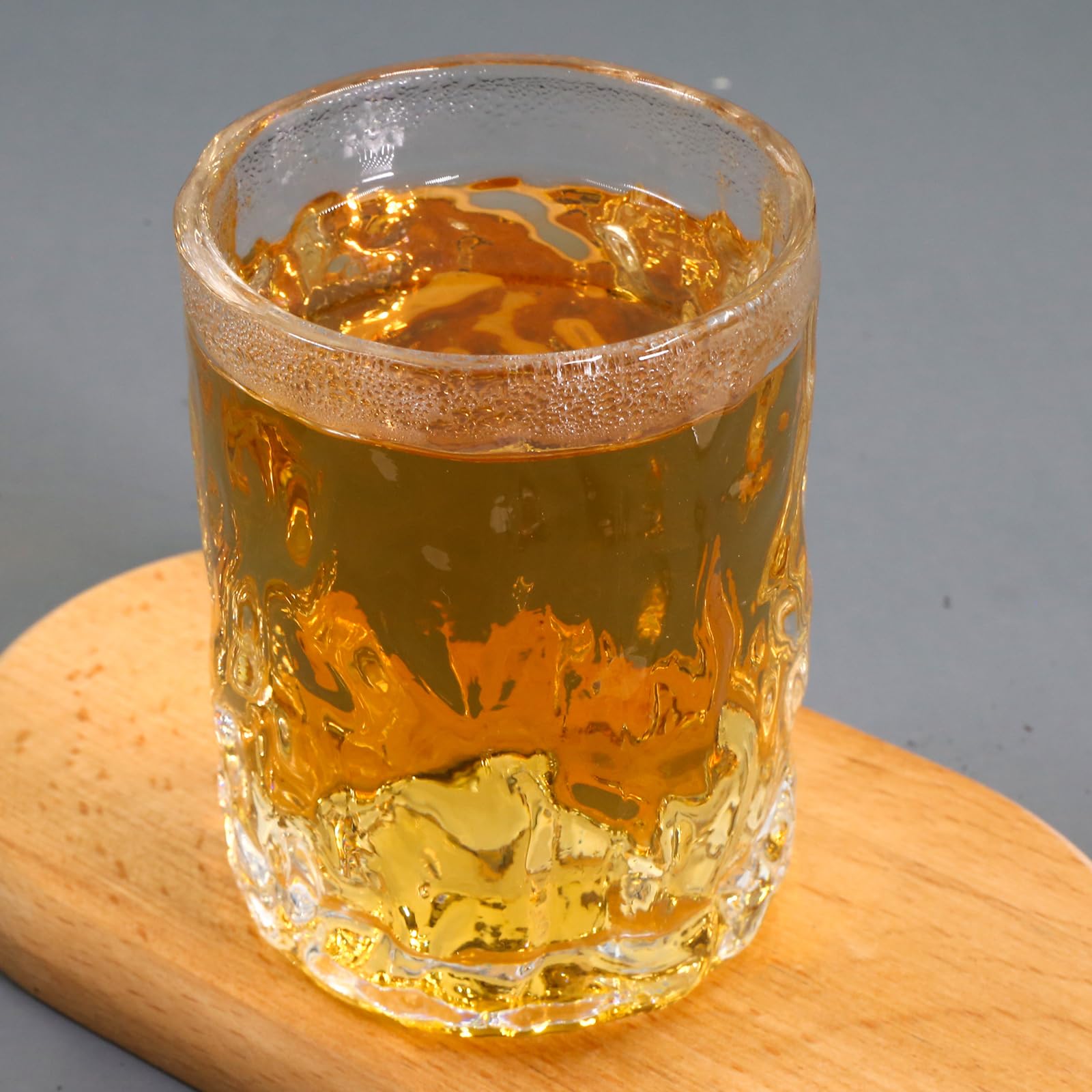 FullChea tea in cup with steam promotes ritual and calm moments.