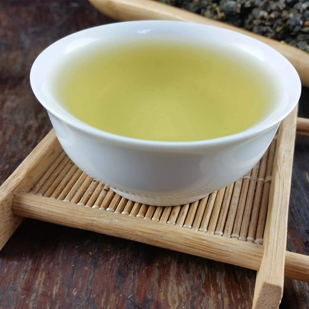 FullChea Alishan tea leaves rolled into granules before infusion, indicating careful processing.