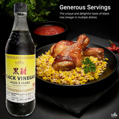 Fusion Select Chinese Black Vinegar pour in a glass, perfect for stir-fries and marinades