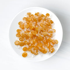 Fusion Sweets Butterscotch yellow candies in a ready-to-serve bulk display.