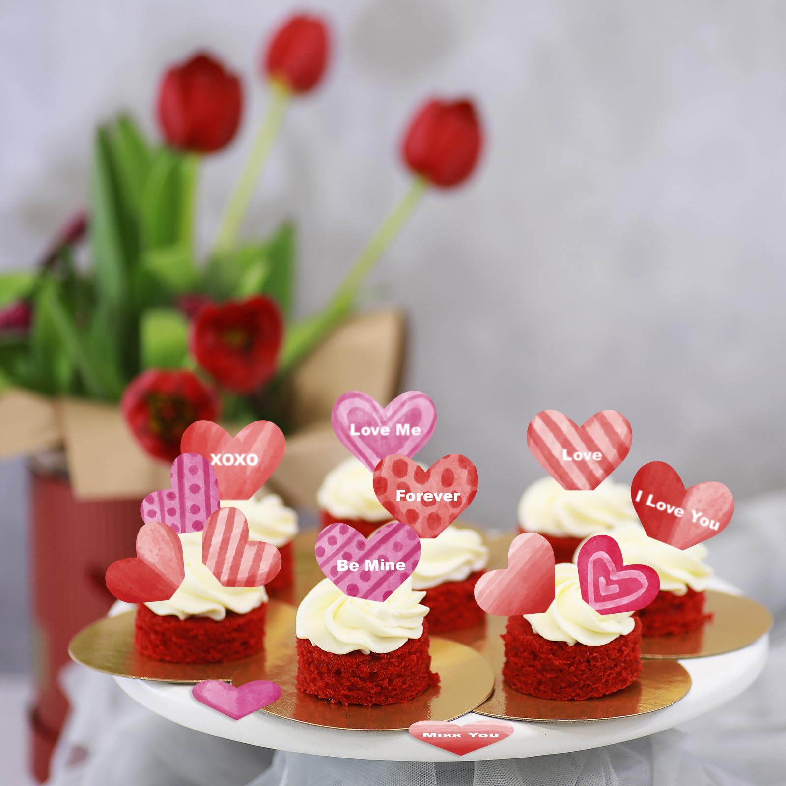 Fyeoxle heart toppers on a cupcake add festive flair.