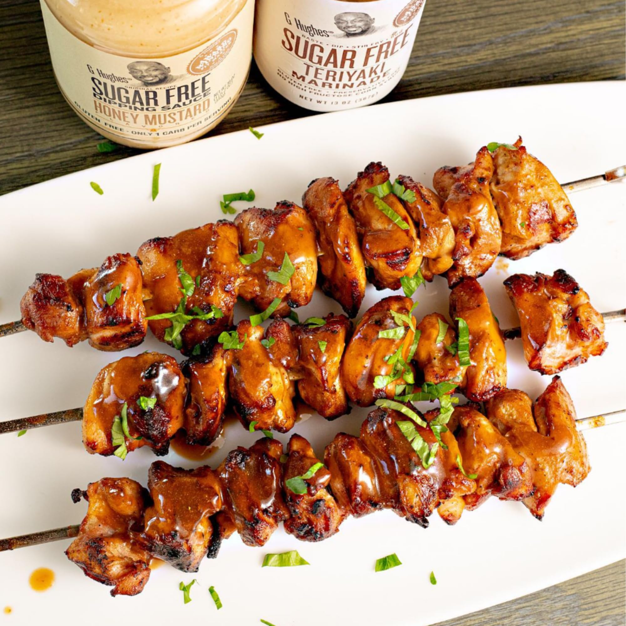G Hughes Teriyaki sugar free marinade glazing a sizzling steak
