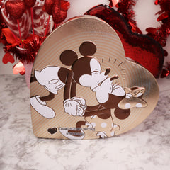 Galerie Disney artwork collectible tin adds keepsake value after chocolates are gone.