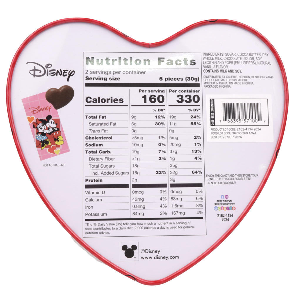 Galerie tin open with chocolates, showcasing 10 milk hearts and creamy texture.