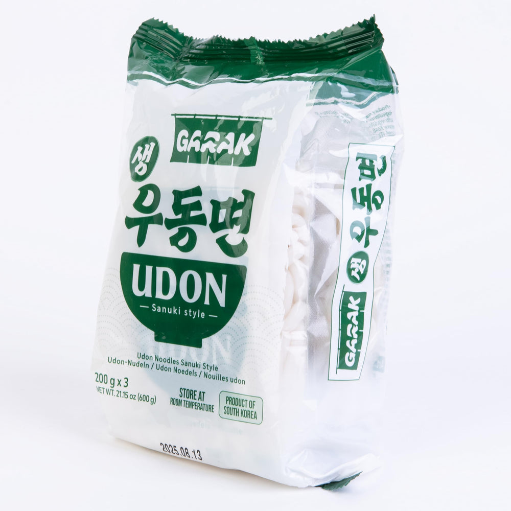 Garak udon no-soup-base image communicates pairing with own broth.