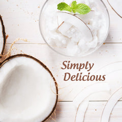 Pouring Garden of Life coconut oil demonstrates versatility in cooking.