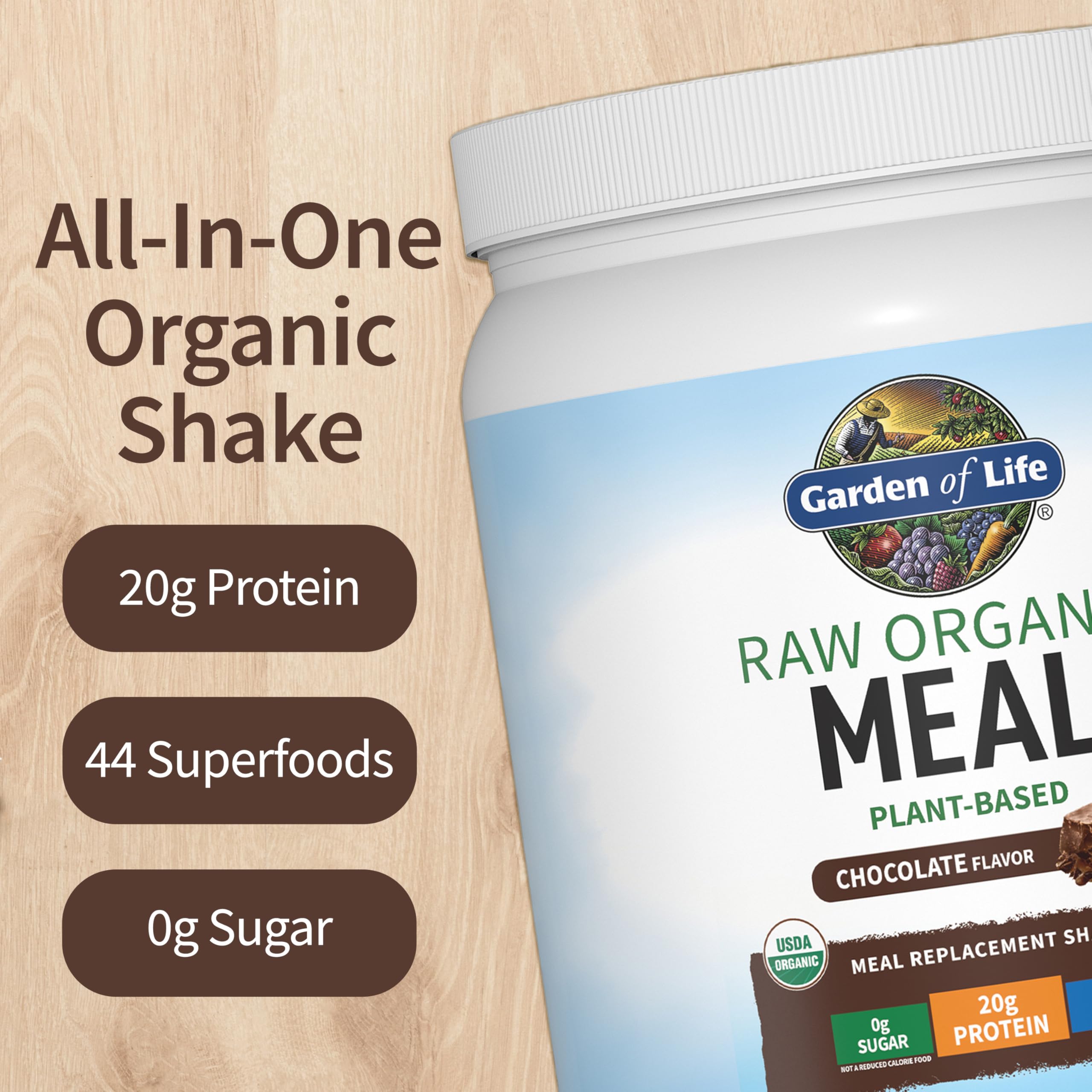 Garden of Life Meal Replacement Shakes chocolate container on kitchen counter with protein-rich ingredients.
