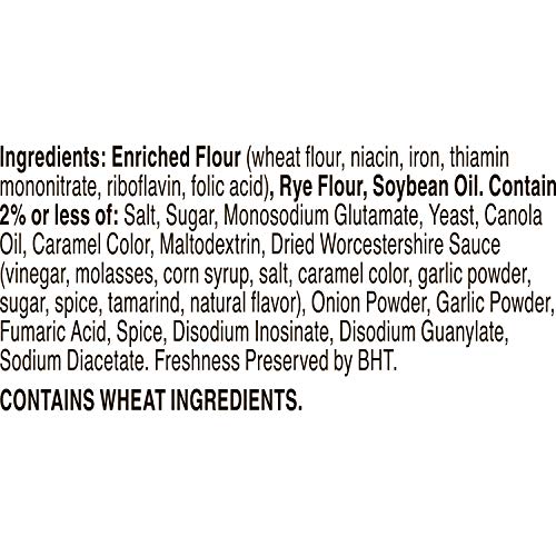 Seasoning dust on Gardetto's garlic rye chips surface highlights flavor