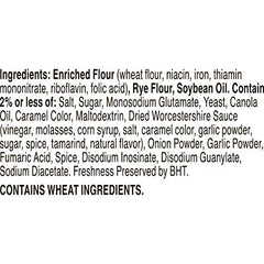 Seasoning dust on Gardetto's garlic rye chips surface highlights flavor