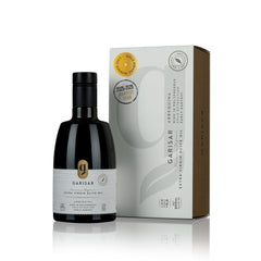 Garisar Early Harvest Arbequina bottle with vibrant color and premium aroma.