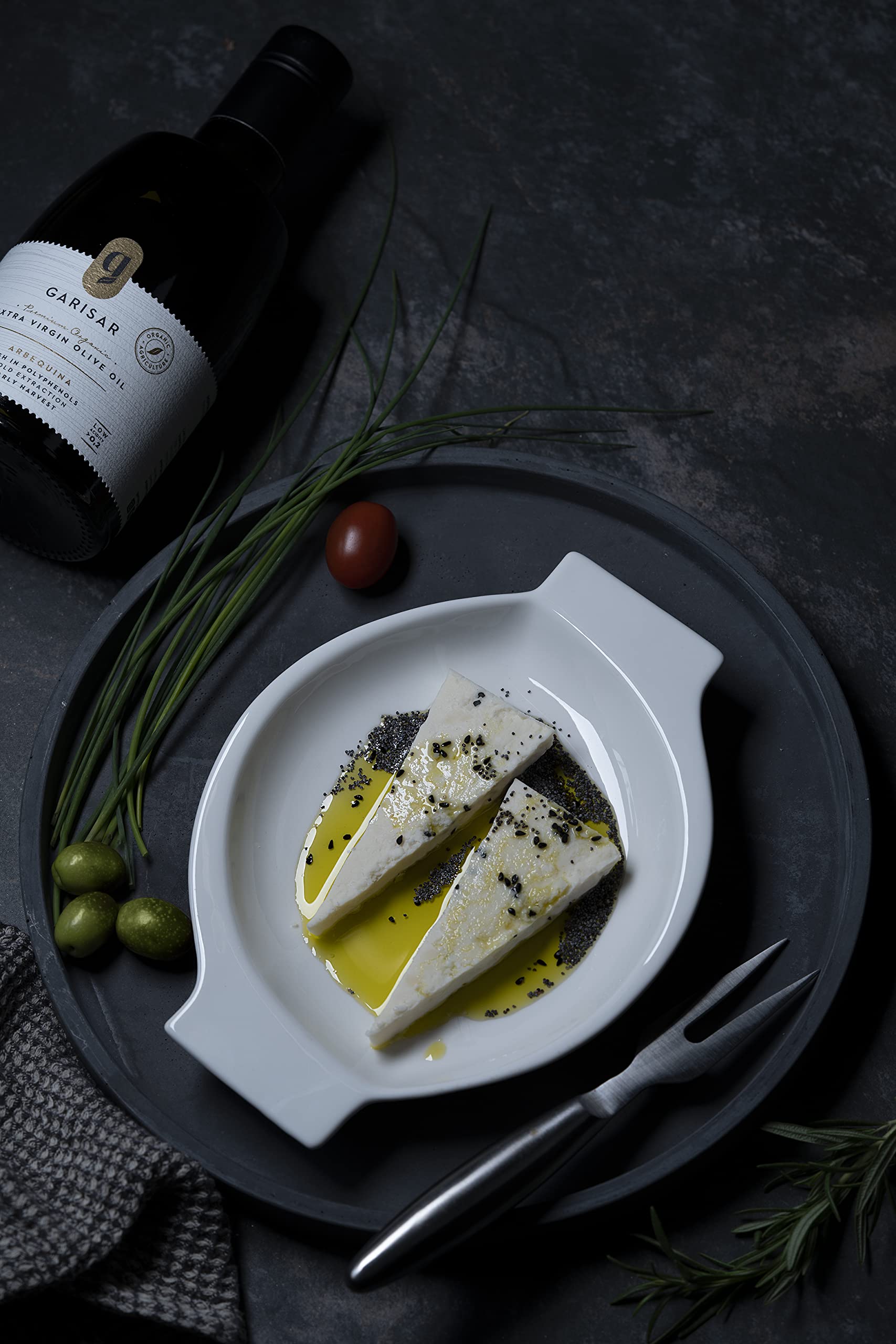 Garisar Organic hand-picked Arbequina olives with certification seal.