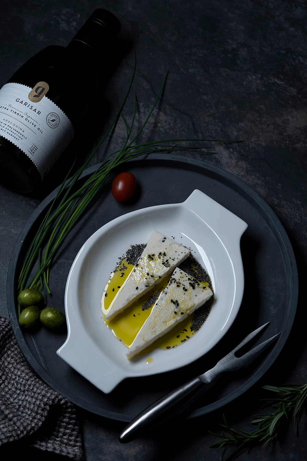 Garisar Organic hand-picked Arbequina olives with certification seal.