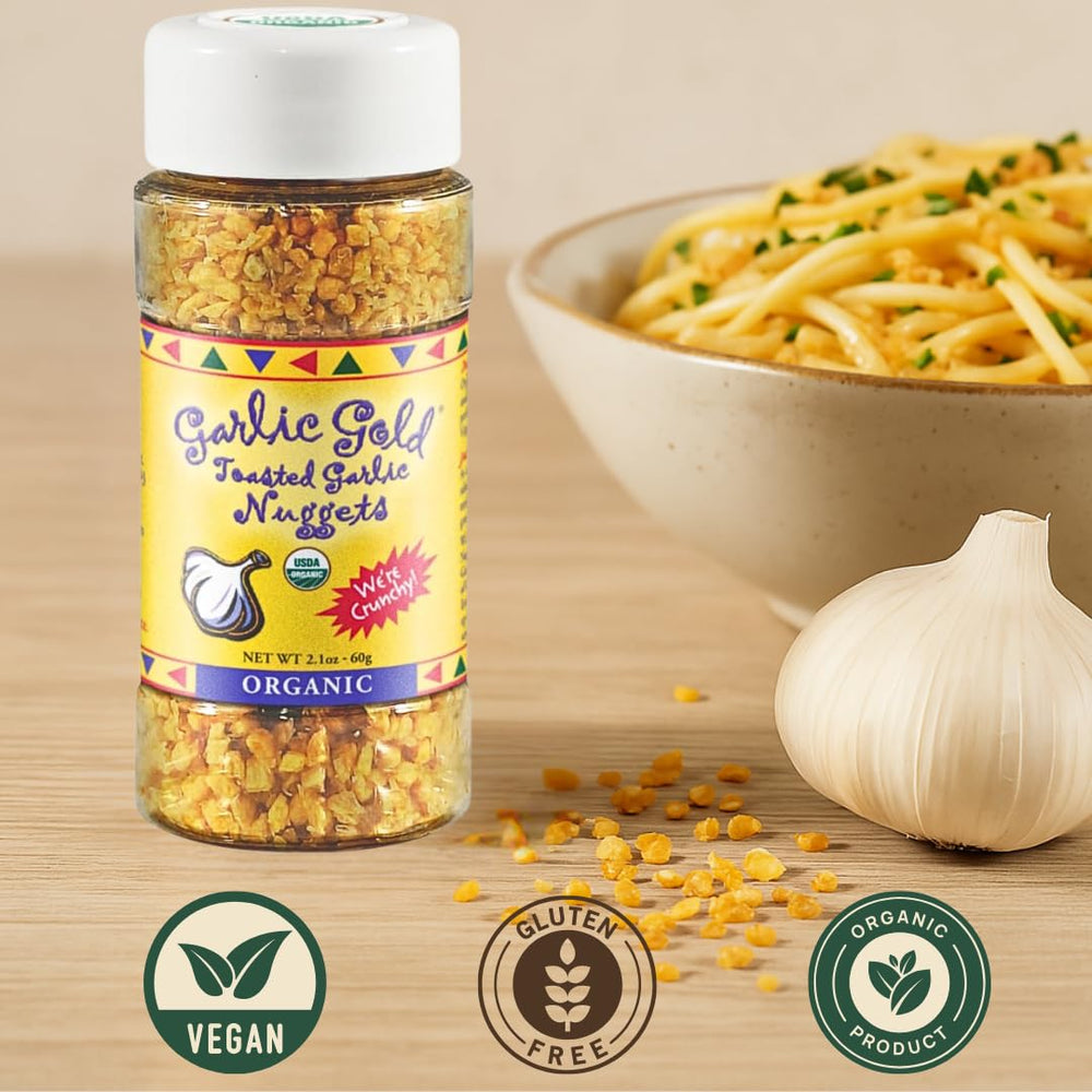Jar of Garlic Gold roasted garlic chunks in olive oil for easy cooking.