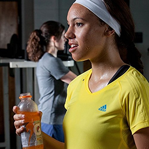 Action shot of athlete drinking G2 during training