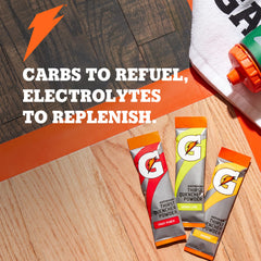 Gatorade Thirst Quencher Orange packets being dispensed into a bottle for quick mix