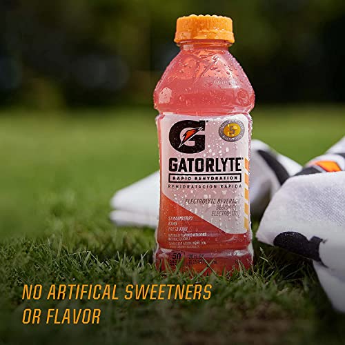 Gatorlyte bottle beside glass illustrates hydrating, refreshing beverage