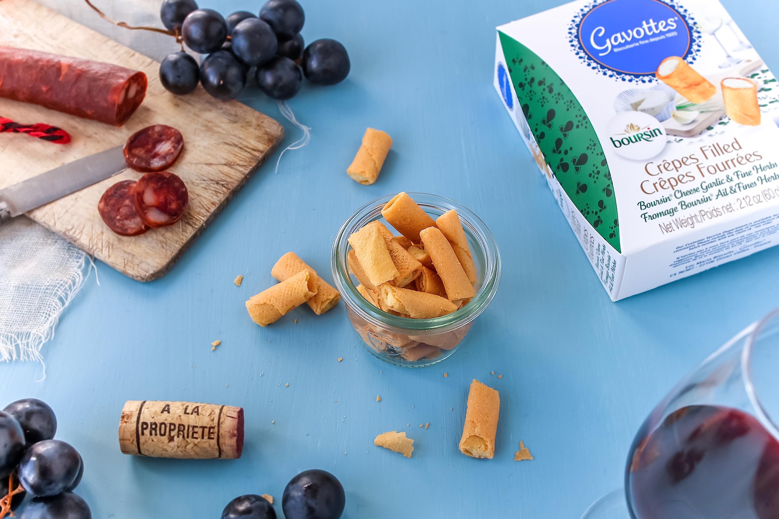 Gavottes Boursin-filled mini crepes closeup with cheese shows creamy filling and flaky layers.