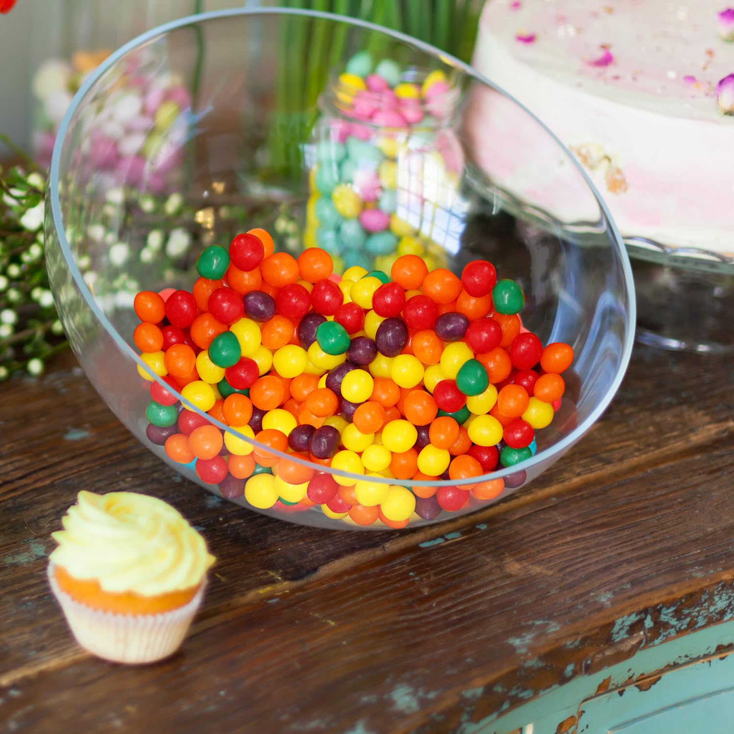 GEEOOLLAH party buffet setup featuring colorful chewy fruit candies