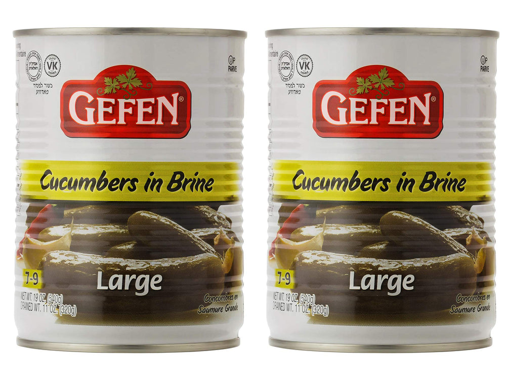 Gefen large pickled cucumber in brine close-up; crunchy bite for snacking.