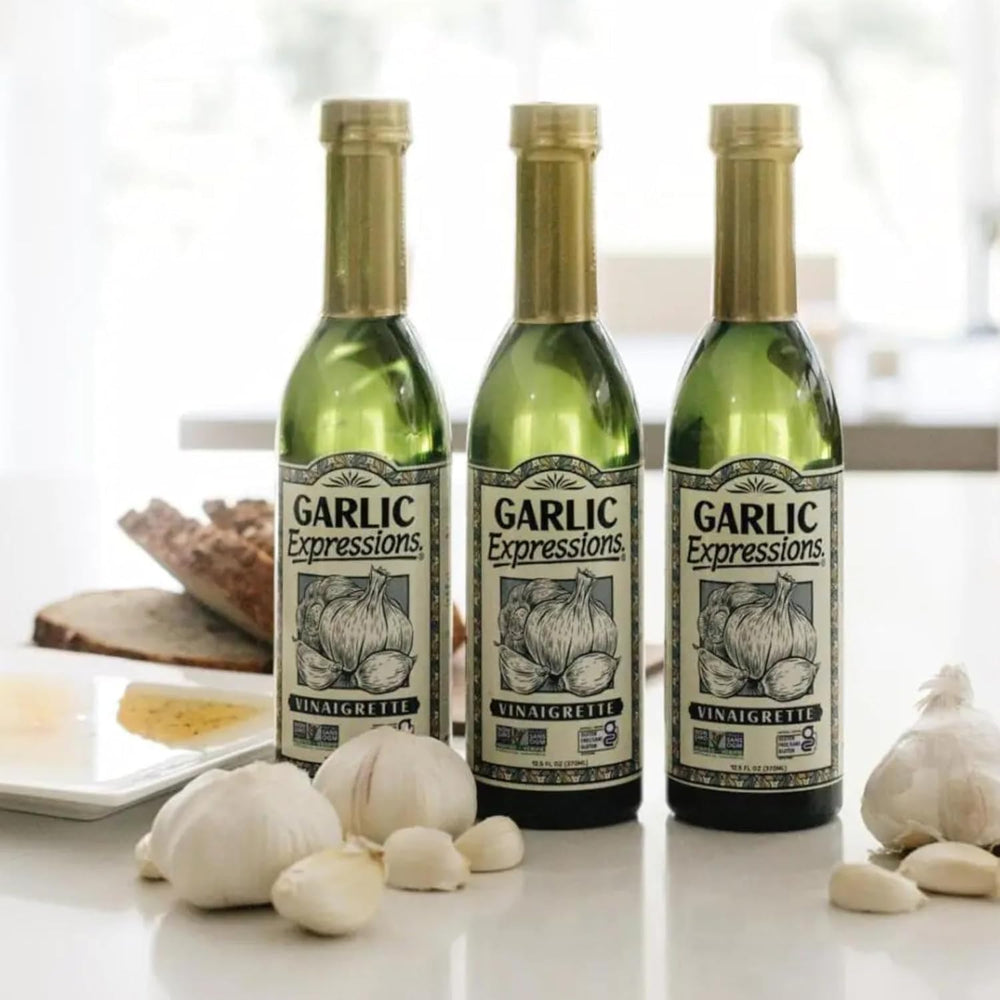 Generic Garlic Expressions being poured over greens, ideal for quick, flavorful salads
