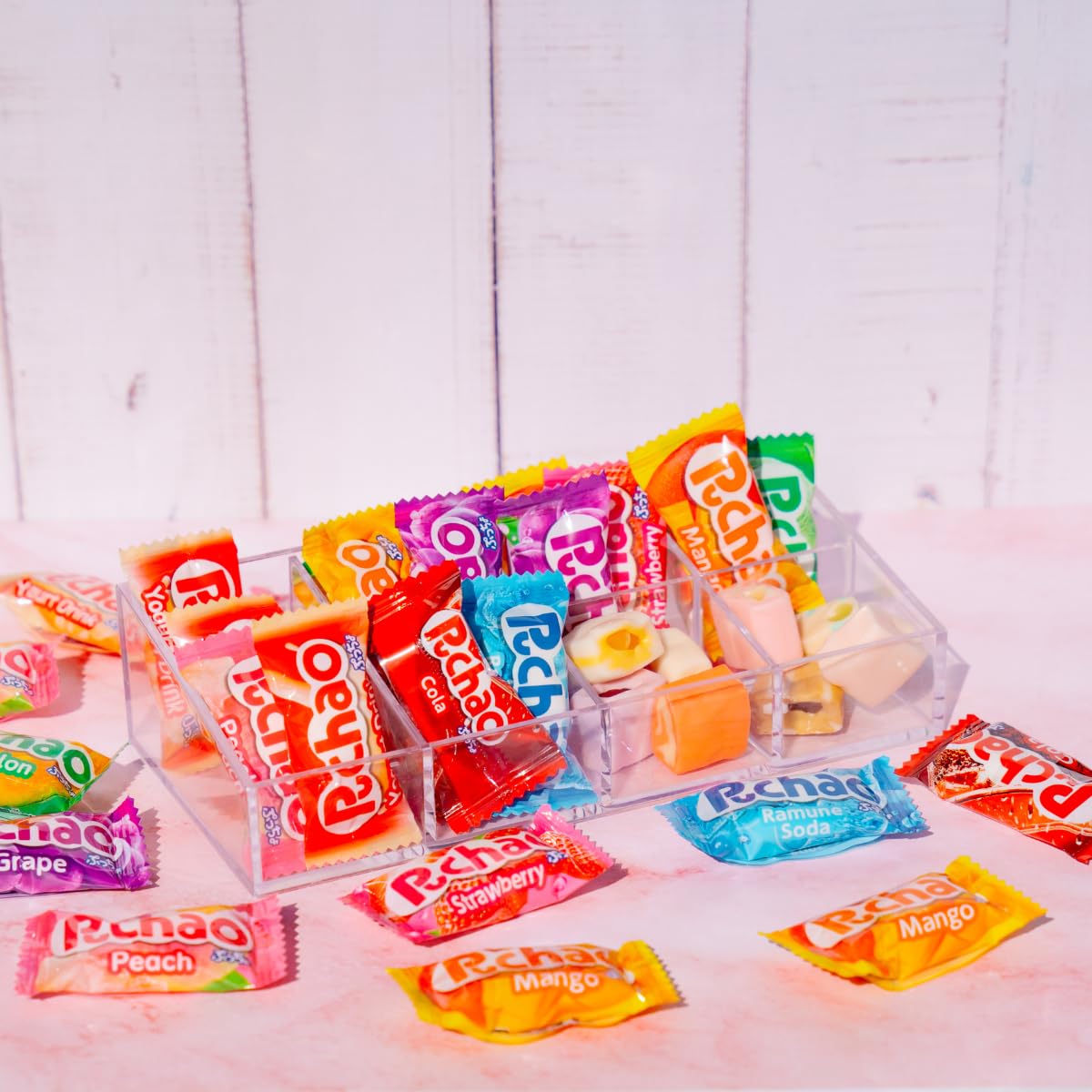 Trio pack of Puchao candies displayed on a shelf for variety