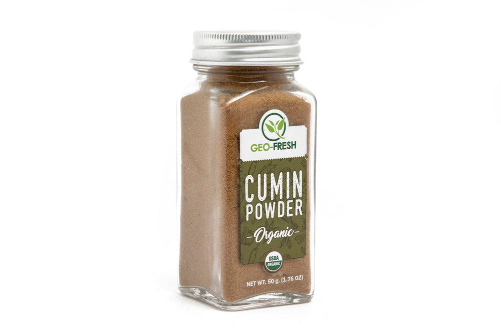 Geo-Fresh Organic Cumin Powder closeup showing vibrant color and ground texture.