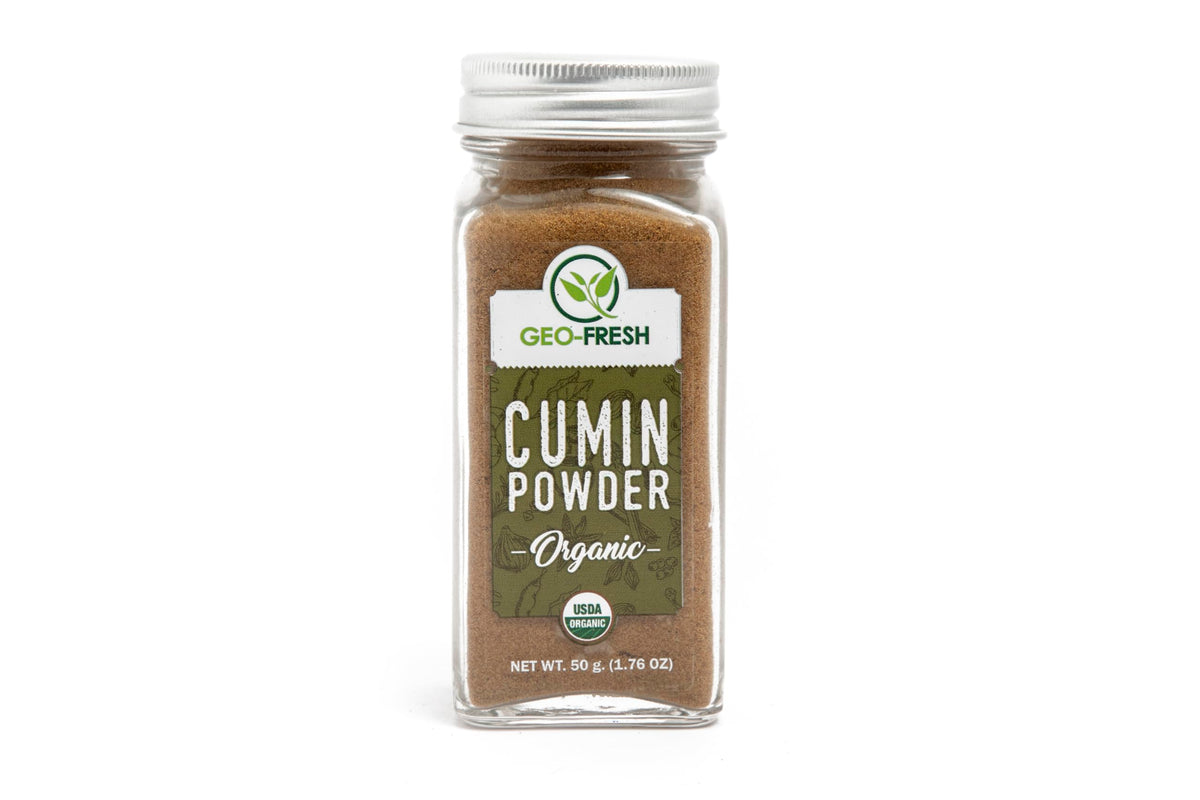 Geo-Fresh Organic Cumin Powder jar pouring for rich flavor in cooking.