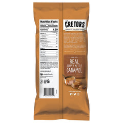 Closeup of buttery caramel glaze on G.H. Cretors popcorn, indulgent texture
