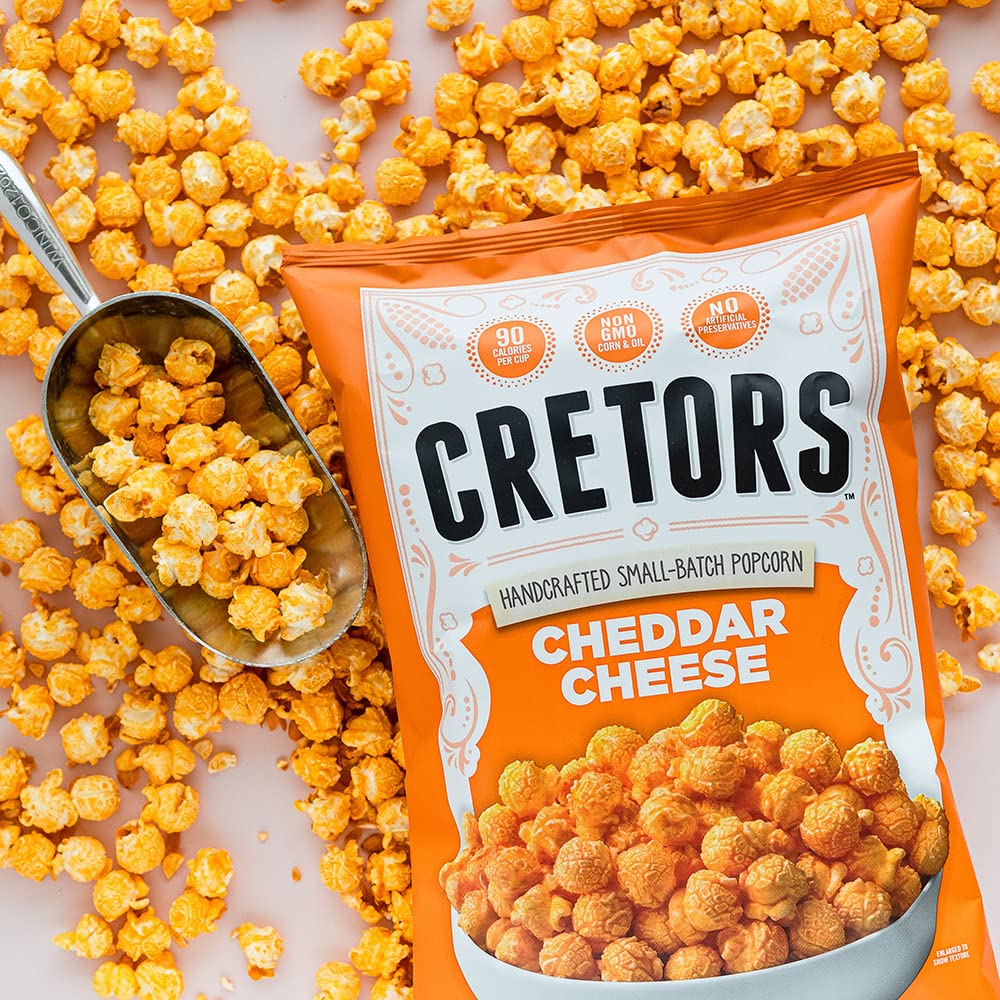 G.H. Cretors cheddar cheese corn small-batch kettle image suggests artisanal pop.