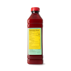 GHANA HERITAGE red palm oil pour for sautéing with rich color.