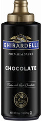 Ghirardelli Black Label chocolate sauce bottle pouring for rich dessert flavor.