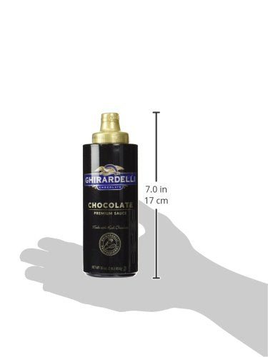 Close-up of Ghirardelli bottle showing smooth texture and convenience.
