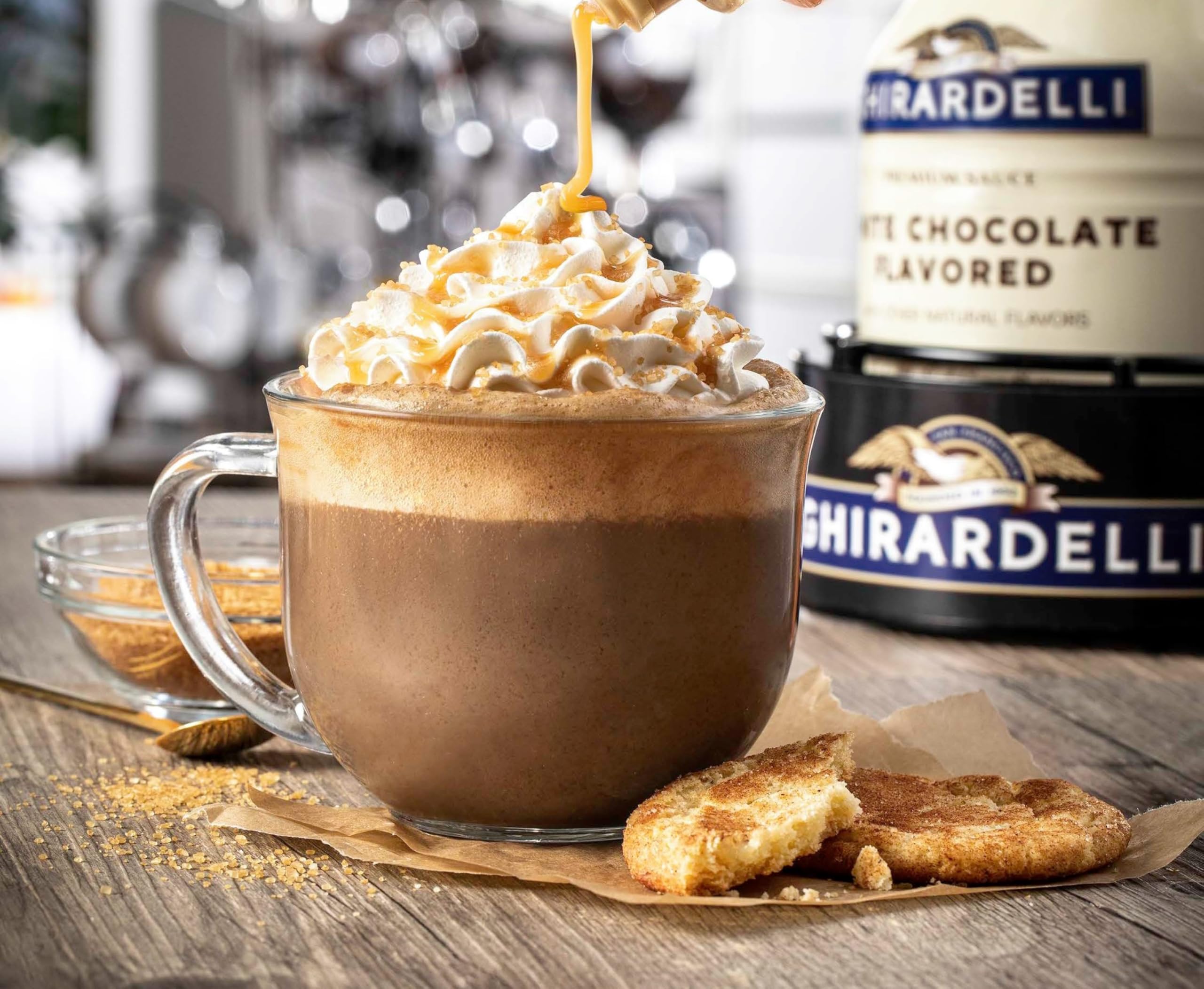 Ghirardelli Caramel Sauce dessert topping highlights creamy texture on cakes and sundaes.