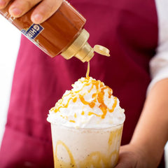 Ghirardelli caramel sauce espresso-drink mix invites barista-style flavor at home