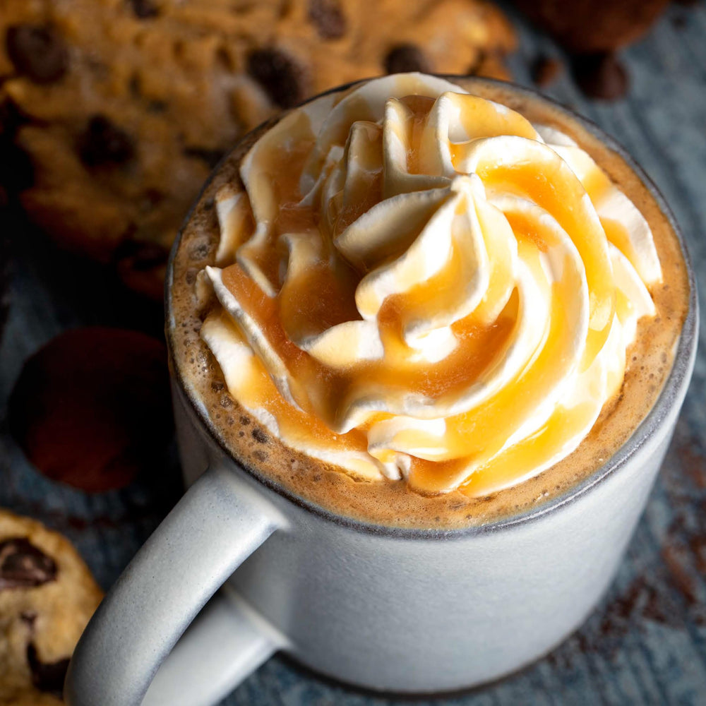 Ghirardelli caramel sauce ice cream topping for smooth finish.