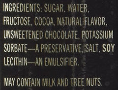 Ghirardelli chocolate sauce over pancakes elevates toppings.
