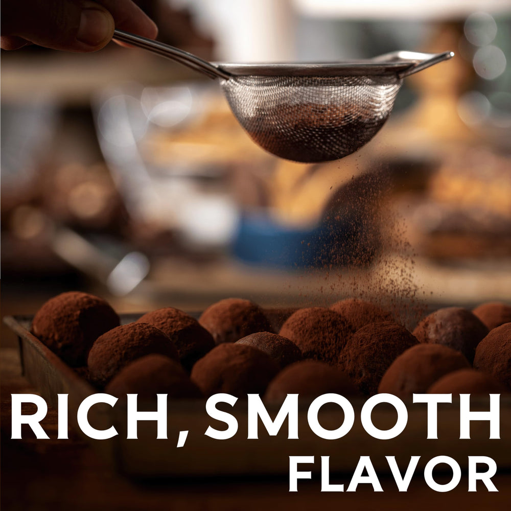 Ghirardelli cocoa powder in a resealable pouch for easy scooping.