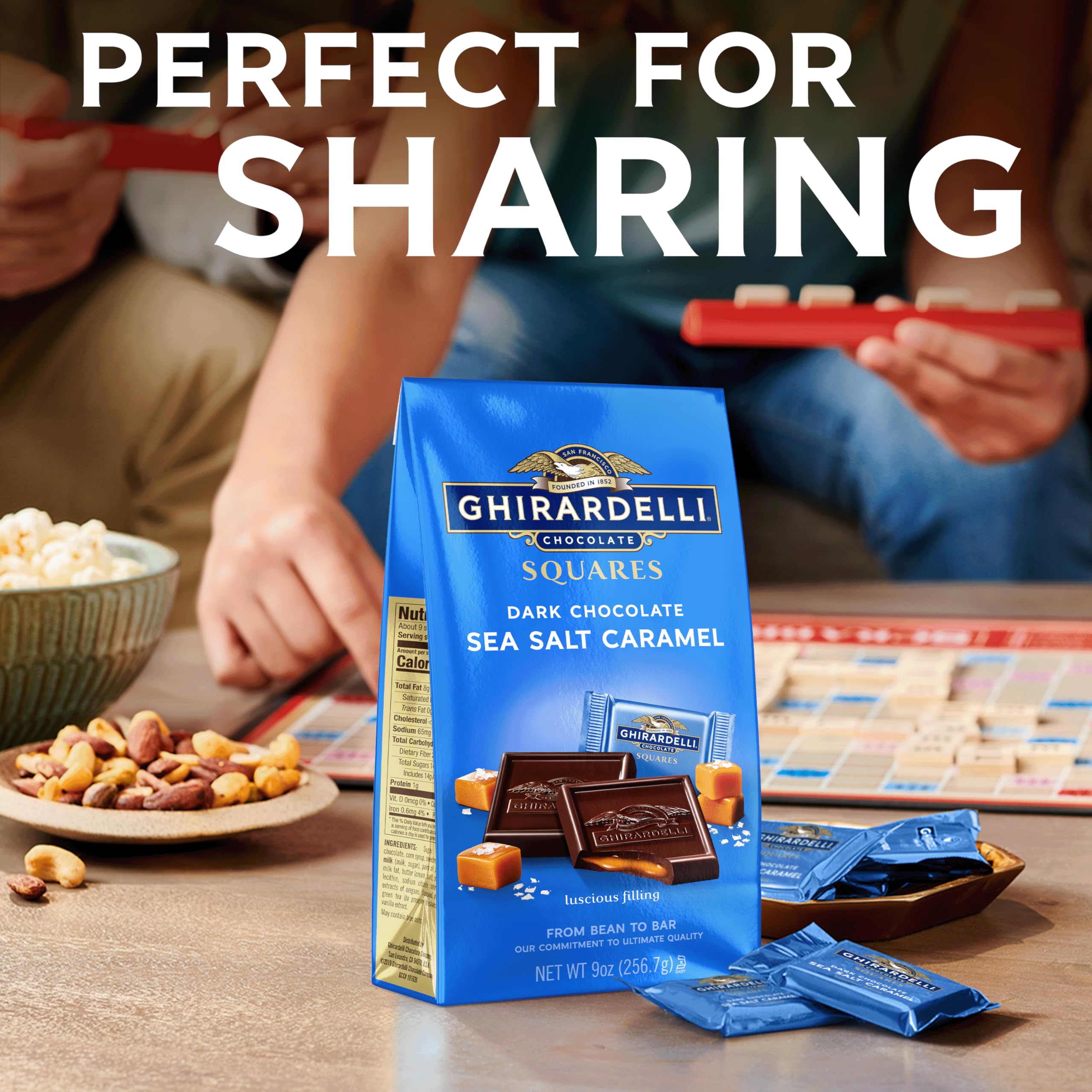 Ghirardelli gift-ready squares arranged for a dessert table.