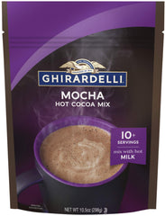 Ghirardelli hot cocoa mocha cup steaming demonstrates creamy beverage ideal for cold evenings.