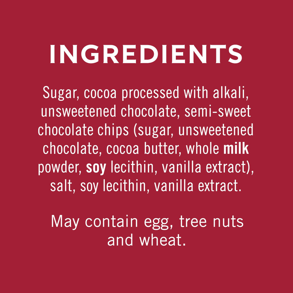 Pouring hot milk over Ghirardelli cocoa creating a smooth beverage