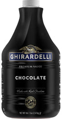 Ghirardelli premium chocolate sauce bottle pouring over coffee for a mocha topping