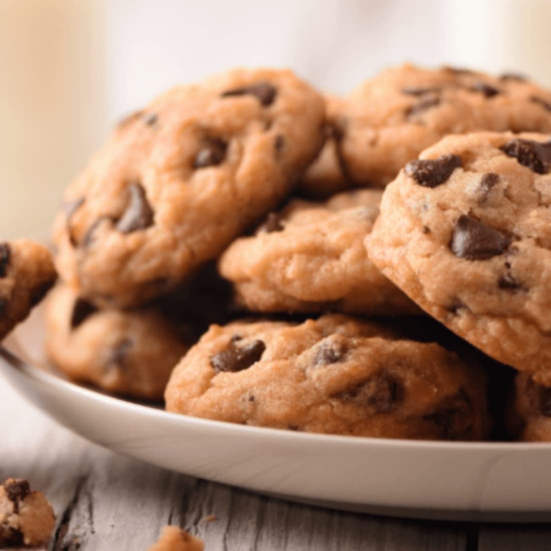Ghirardelli chips in dough, highlighting decadent chocolate spread.