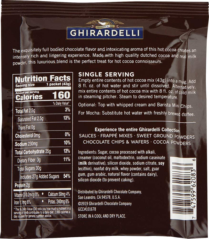 Pouring hot water into a mug with Ghirardelli envelopes for a cozy treat.