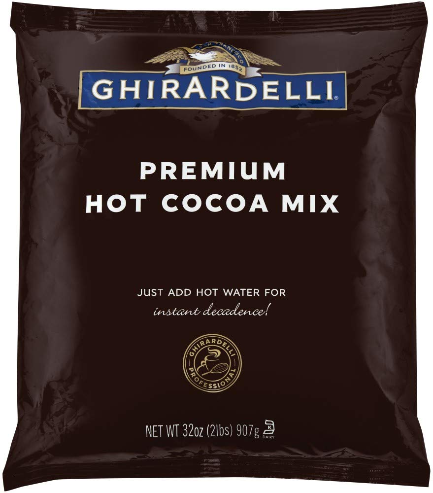 Ghirardelli hot cocoa mix in a steaming mug for cozy indulgence.