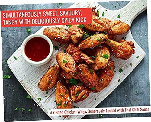 G Hughes Thai Chili Wing Sauce drizzle on dumplings and vegetables
